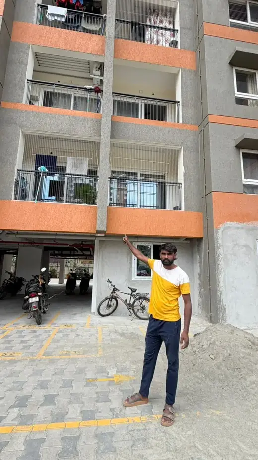 Chennai apartment building with balcony safety nets installed across multiple floors